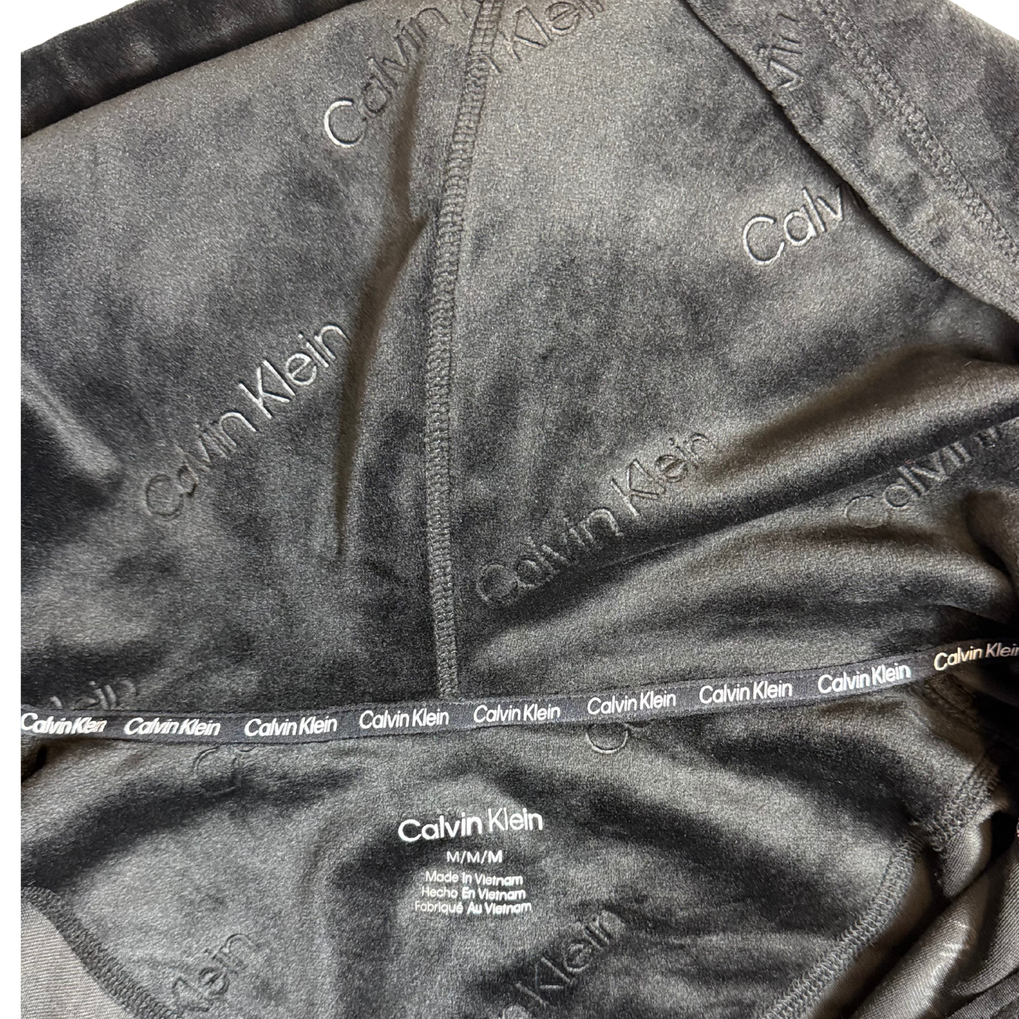 Women's Zip-Up Hoodie Size M with Embossed Logo & Pockets – Stretchy Polyester Blend